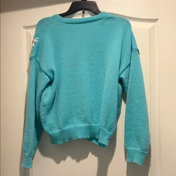 Chic Turquoise Cardigan with Floral Embellishments - Picture 2 of 3